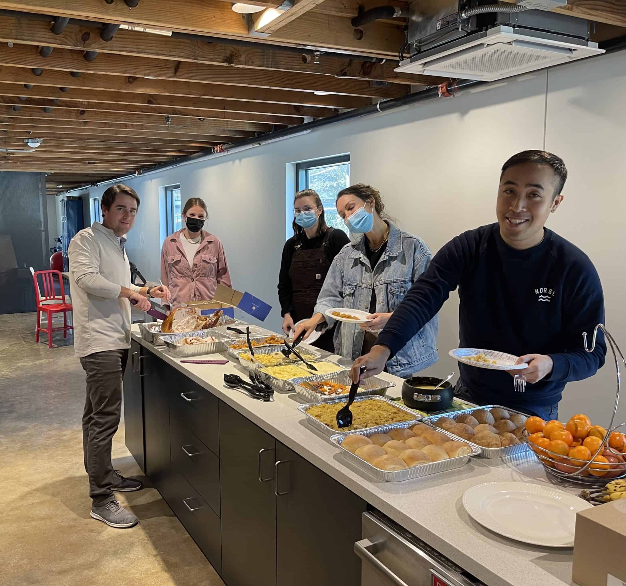 CarbonBetter employees during a team lunch at Austin HQ.