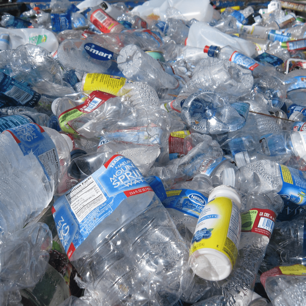 A pile of crushed plastic water bottles.