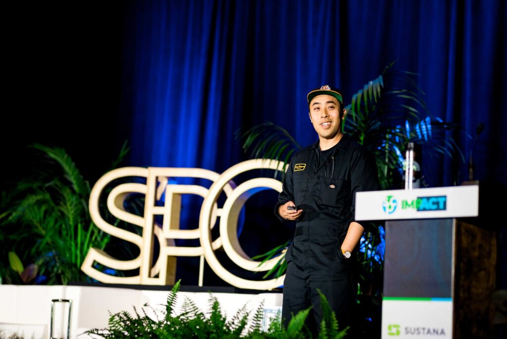 Tri Vo, President and Founder of CarbonBetter, speaking at SPC Impact speaking on behalf of another company he co-founded: Fierce Whiskers Distillery.